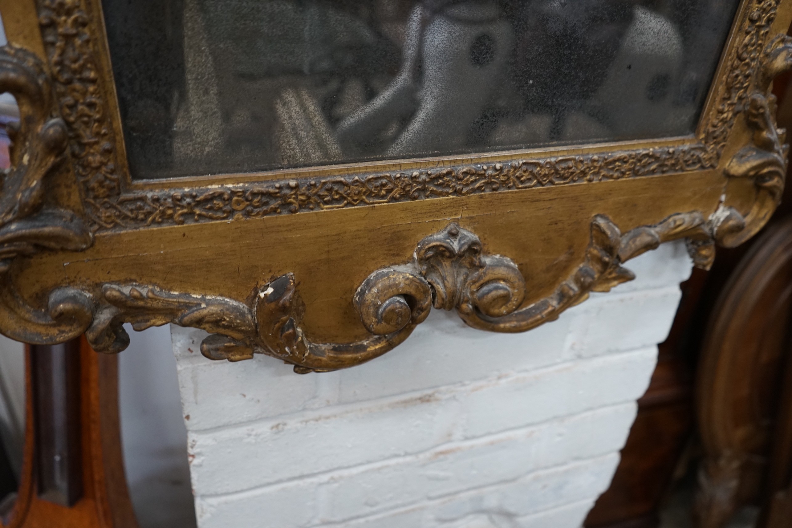 A 19th century carved giltwood wall mirror, width 61cm, height 110cm